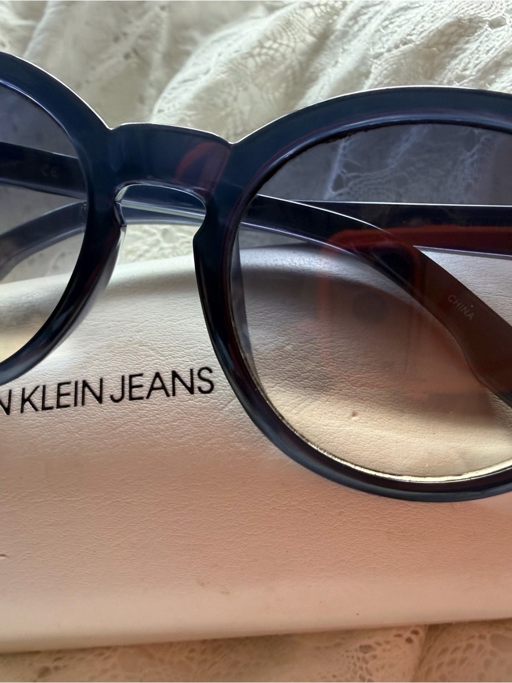 Calvin Klein Jeans Women's Navy Round Sunglasses with Gradient Lenses